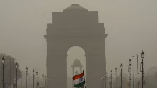 The India Gate engulfed in a layer of dust, in New Delhi