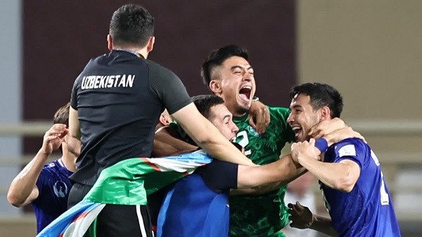 Uzbekistan's players celebrate after their 2026 FIFA World Cup Qualification
