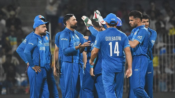 Afghanistan players celebrate a Canada wicket on Thursday
