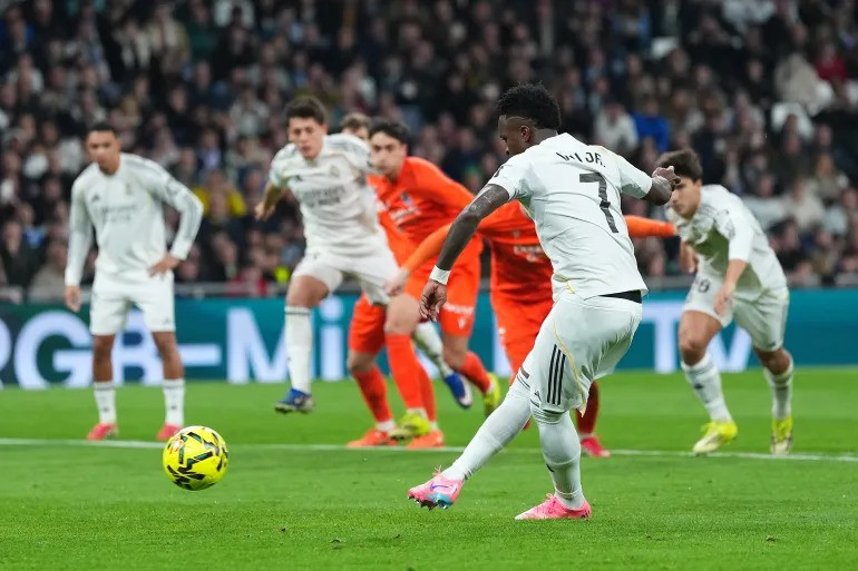 Vinicius Junior scores Madrid's fourth goal from the penalty spot
