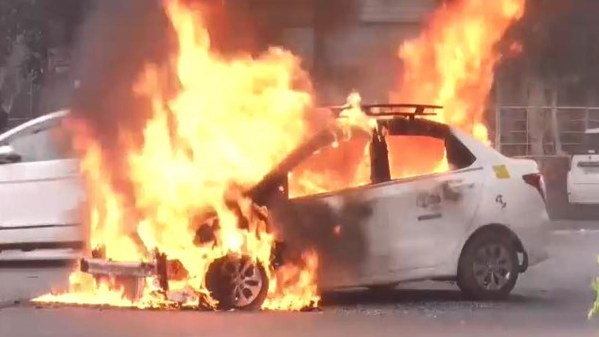 Car catches fire near Bhajanpura metro station in Delhi